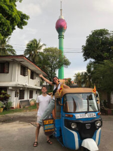Tuk tuk safari guests near the Lotus Tower Sri Lanka